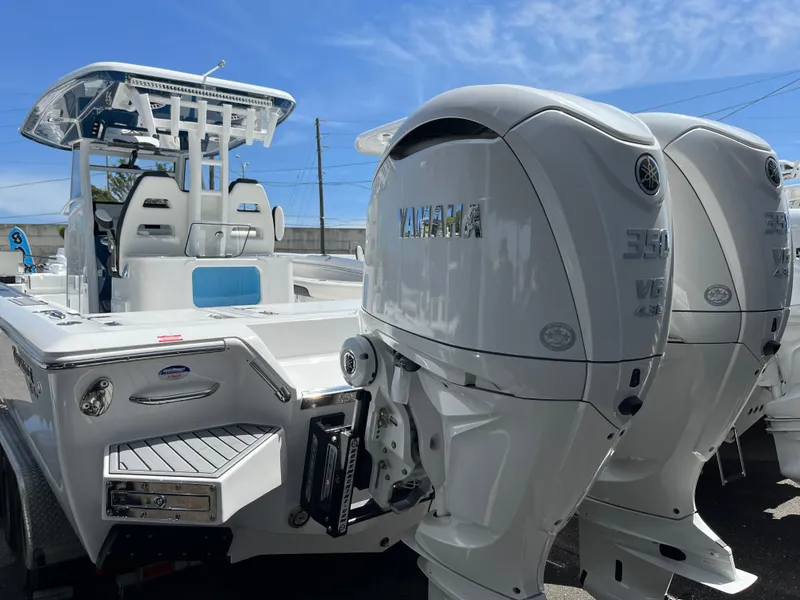 Slide: The Image of 2025 Tidewater 3100 Carolina Bay boat with twin Yamaha 350 engines. - 3