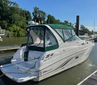 Slide: The Image of 2000 Chaparral 300 Signature boat docked on a sunny day. - 12
