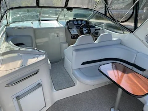 Slide: The Image of Interior of 2000 Chaparral 300 Signature boat with seating and helm. - 2