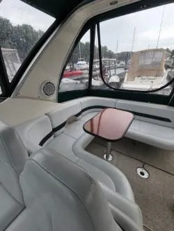 Slide: The Image of 2000 Chaparral 300 Signature boat interior with seating and table. - 4