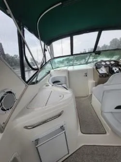 Slide: The Image of 2000 Chaparral 300 Signature boat interior with helm and seating area. - 5