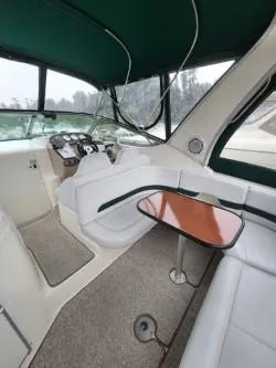 Slide: The Image of Interior of 2000 Chaparral 300 Signature boat with seating and helm. - 7