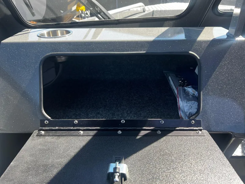 Slide: The Image of 2024 Fish Rite 200 Sportsman boat storage compartment with open hatch. - 15
