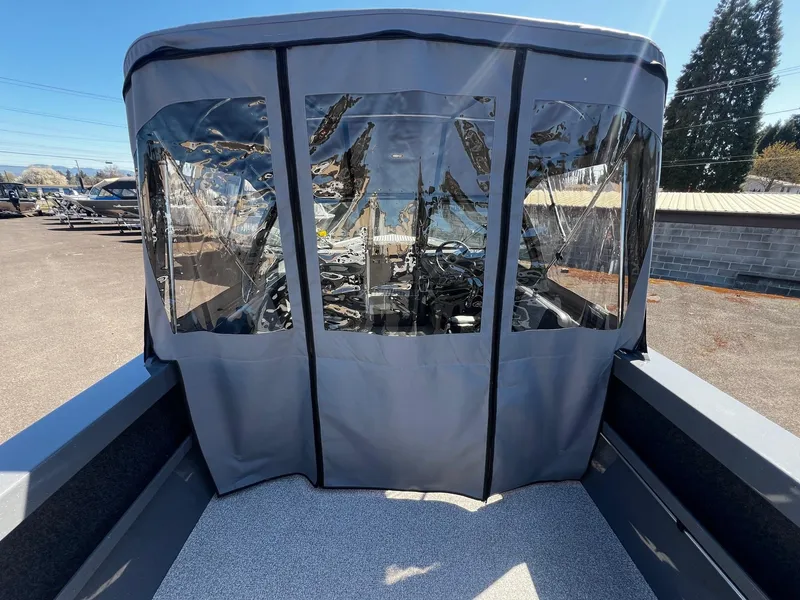 Slide: The Image of 2024 Fish Rite 200 Sportsman boat with enclosed cockpit. - 25