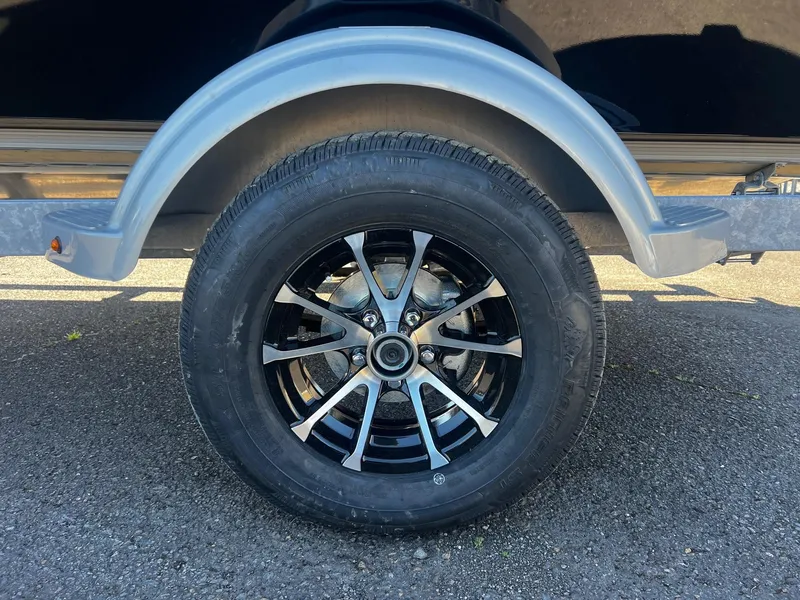 Slide: The Image of Close-up of 2024 Fish Rite 200 Sportsman trailer wheel and tire. - 26