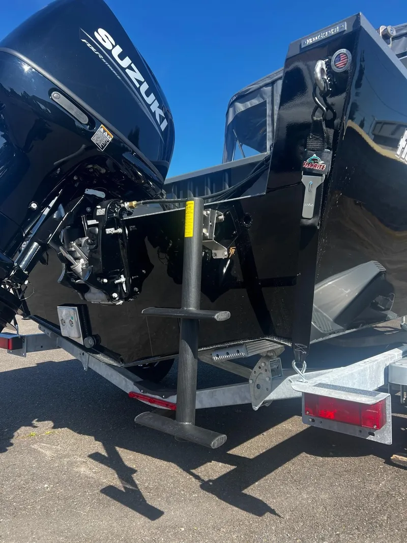 Slide: The Image of 2024 Fish Rite 200 Sportsman boat with Suzuki outboard motor on trailer. - 27