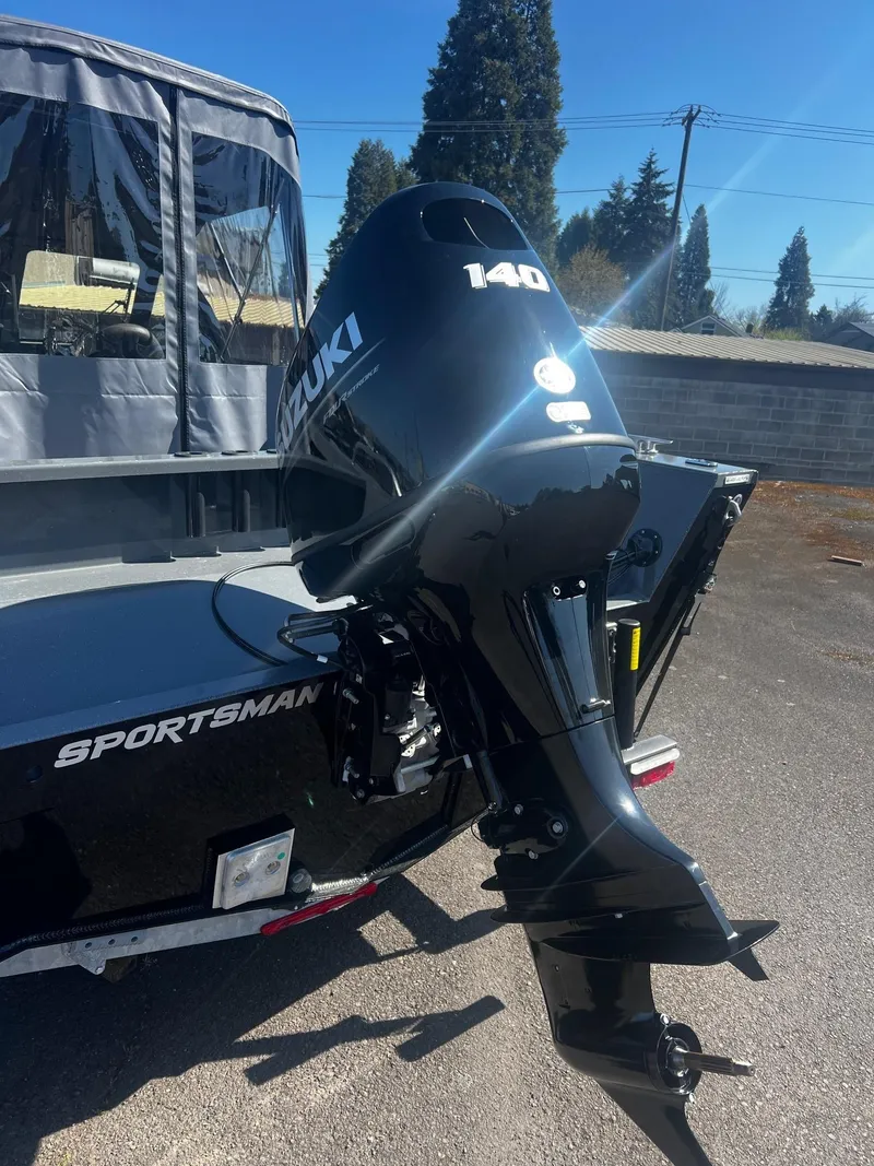 Slide: The Image of 2024 Fish Rite 200 Sportsman boat with Suzuki 140 outboard motor. - 28