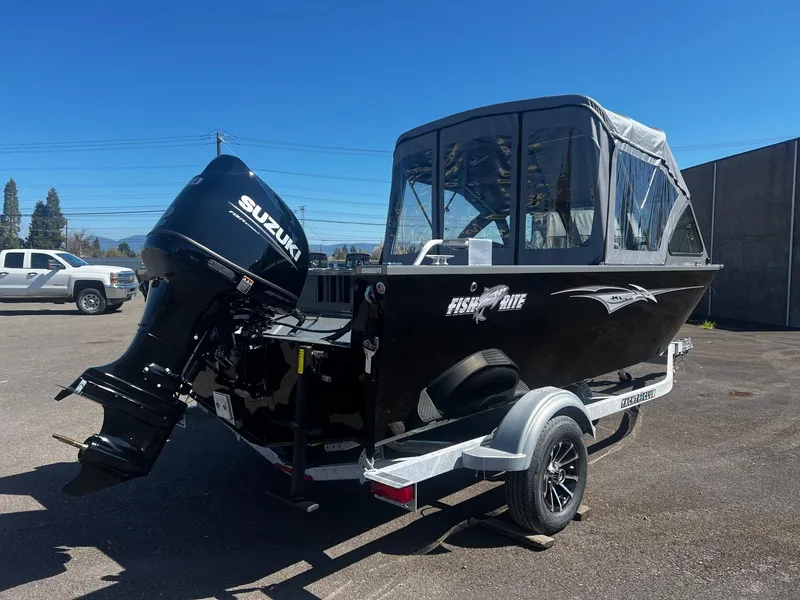 Slide: The Image of 2024 Fish Rite 200 Sportsman boat with Suzuki outboard motor on trailer. - 4