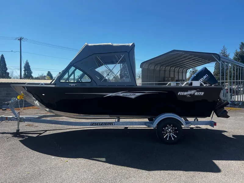 Slide: The Image of 2024 Fish Rite 200 Sportsman boat on trailer in outdoor setting. - 6