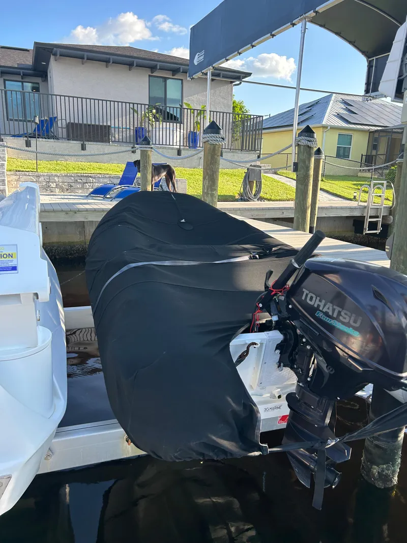 Slide: The Image of Aquila 44 Yacht 2020 with Tohatsu outboard motor docked at marina. - 20