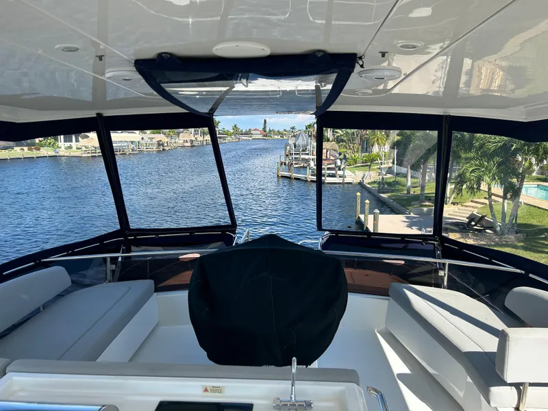 Slide: The Image of Interior view of 2020 Aquila 44 Yacht overlooking a serene waterfront. - 27