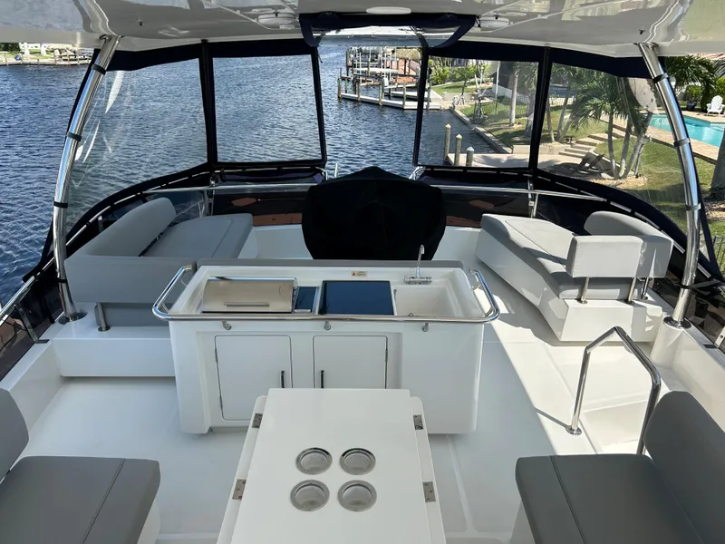 Slide: The Image of Luxurious 2020 Aquila 44 Yacht interior with spacious seating and scenic water views. - 39