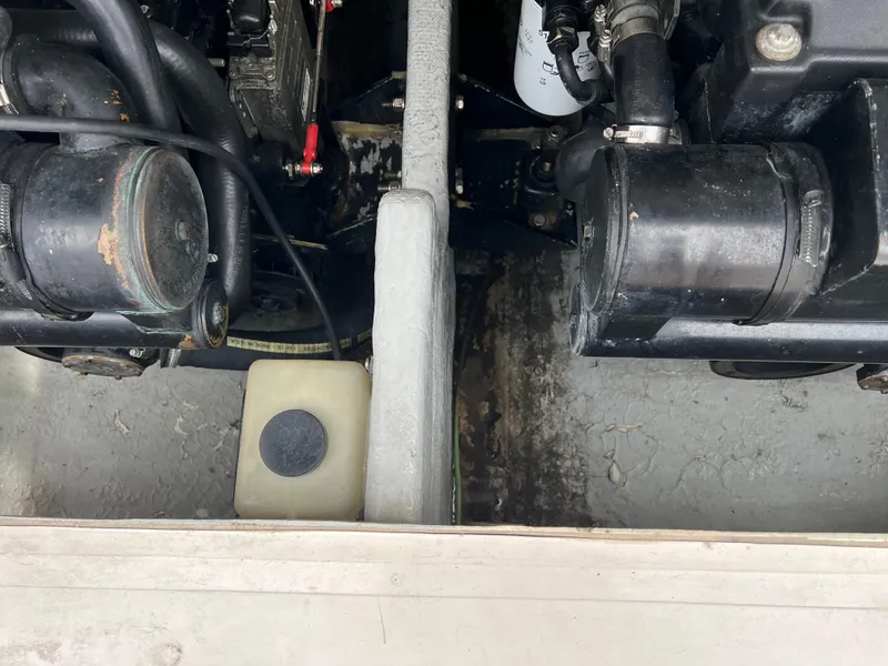 Slide: The Image of Engine compartment of a 2000 Stuart Angler 32 Center Console/Cutty boat. - 25