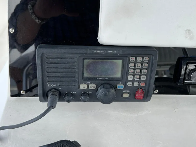 Slide: The Image of VHF marine radio IC-M602 on a 2000 Stuart Angler 32 Center Console boat. - 46
