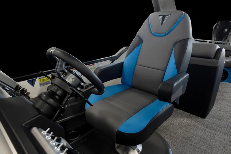 Slide: The Image of Captain's chair and helm of the 2025 Trifecta 25 Sport RF9 DC 3.0+ boat. - 10