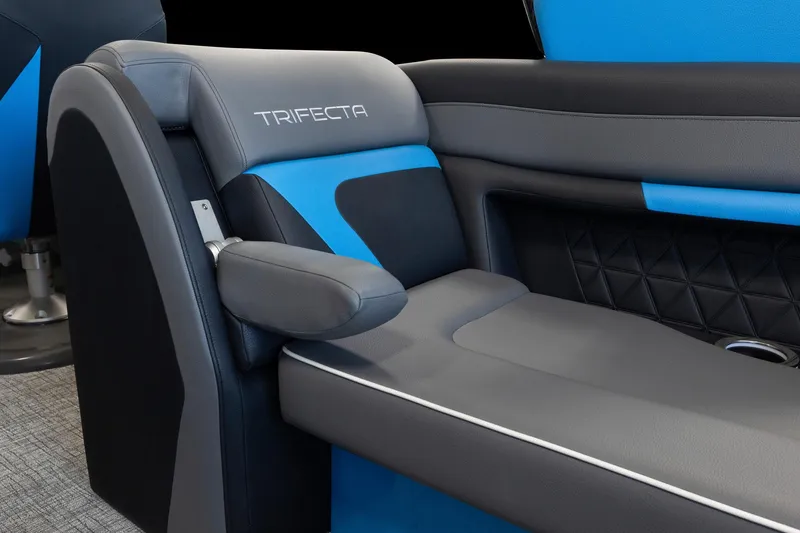 Slide: The Image of 2025 Trifecta 25 Sport RF9 DC 3.0+ luxury boat seating with blue and black upholstery. - 14