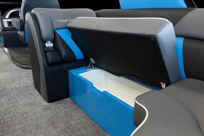Slide: The Image of 2025 Trifecta 25 Sport RF9 DC 3.0+ boat interior with open storage compartment. - 17