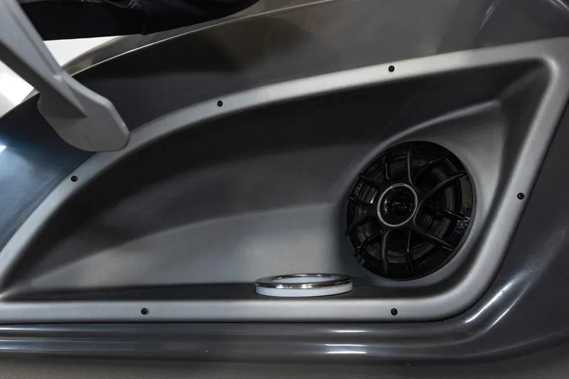 Slide: The Image of Close-up of speaker and cup holder in 2025 Trifecta 25 Sport RF9 DC 3.0+ boat. - 20