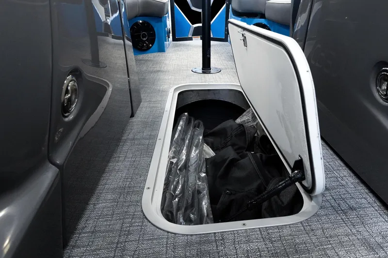Slide: The Image of Storage compartment in 2025 Trifecta 25 Sport RF9 DC 3.0+ boat. - 21