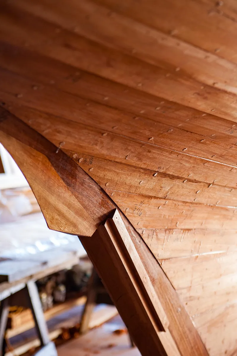 Slide: The Image of Close-up of 1931 Sparkman & Stephens 36 Sloop wooden hull detail. - 26