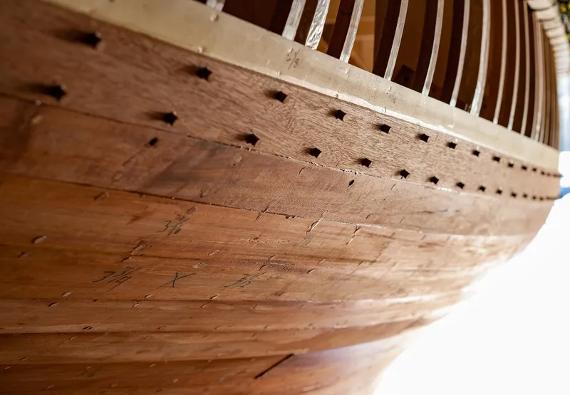 Slide: The Image of Close-up of 1931 Sparkman & Stephens 36 Sloop wooden hull under restoration. - 27