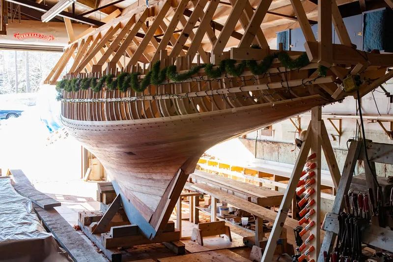 Slide: The Image of Restoration of a 1931 Sparkman & Stephens 36 Sloop in a workshop. - 28