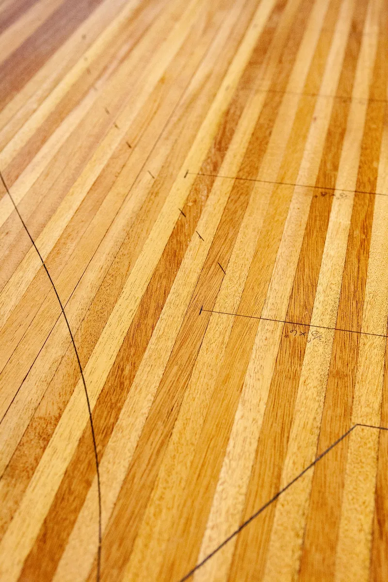 Slide: The Image of Close-up of the wooden deck of a 1931 Sparkman & Stephens 36 Sloop. - 40