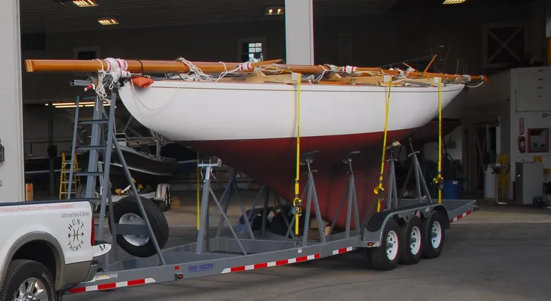 Slide: The Image of 1931 Sparkman & Stephens 36 Sloop on trailer in a boatyard. - 42