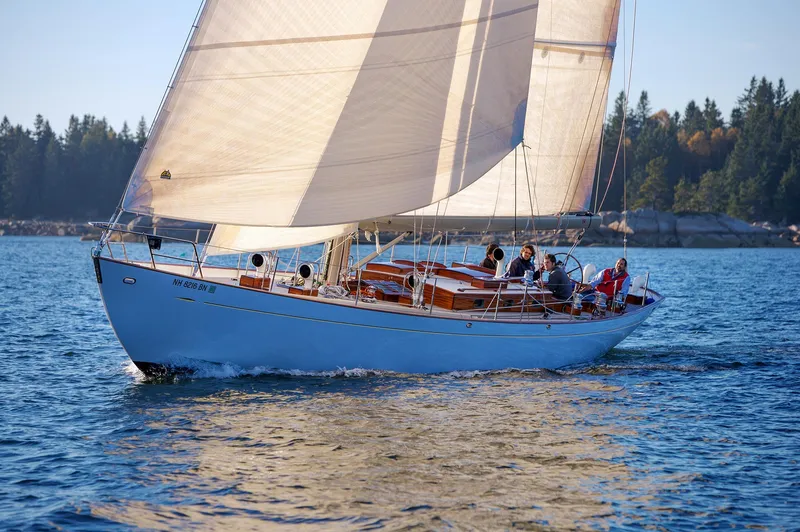 Slide: The Image of 2007 Brooklin Boat Yard Sparkman & Stephens 56 Sloop sailing on a serene lake. - 10