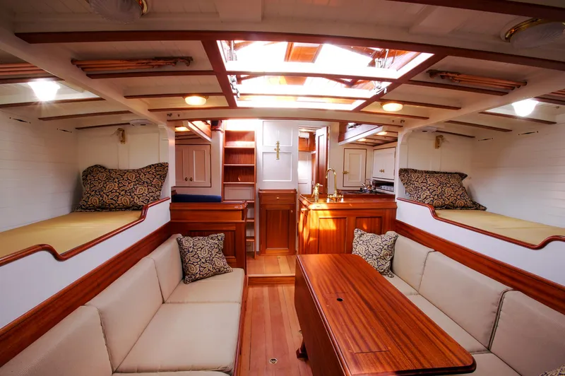 Slide: The Image of Luxurious interior of 2007 Brooklin Boat Yard Sparkman & Stephens 56 Sloop with wooden finishes. - 19