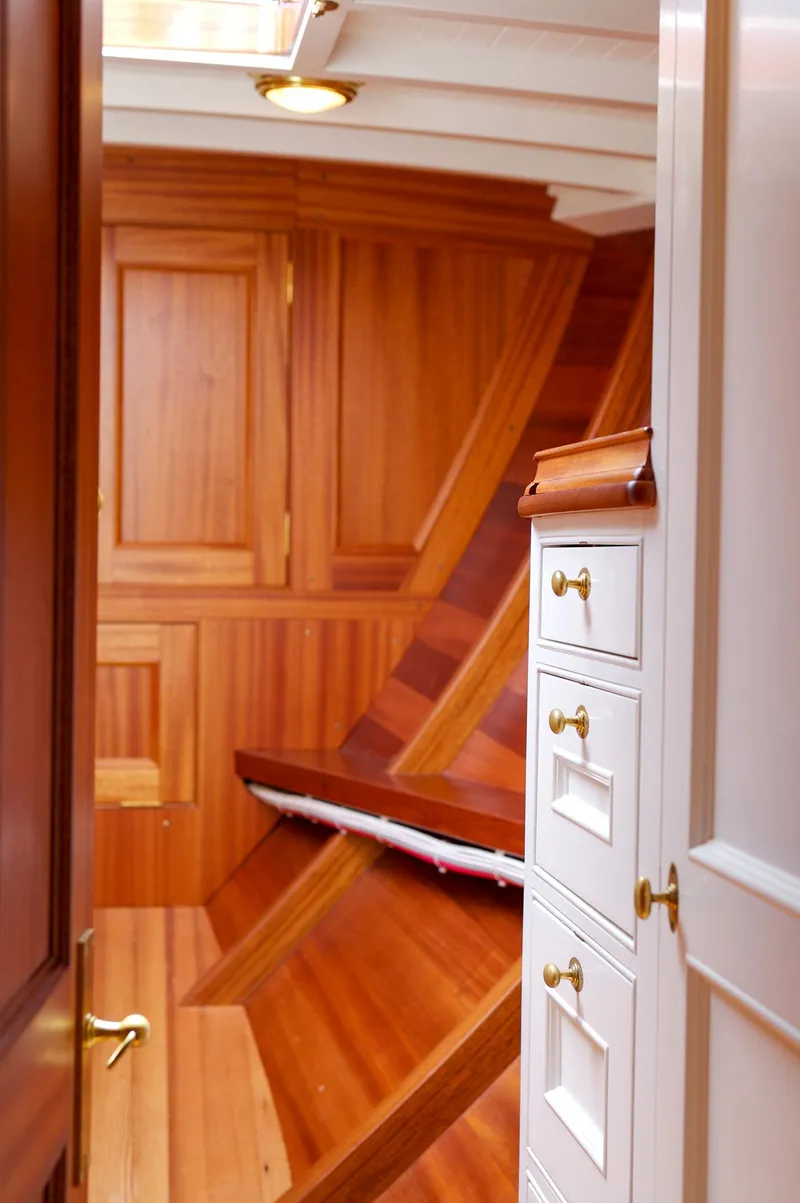 Slide: The Image of Interior of 2007 Brooklin Boat Yard Sparkman & Stephens 56 Sloop with wooden cabinetry. - 23