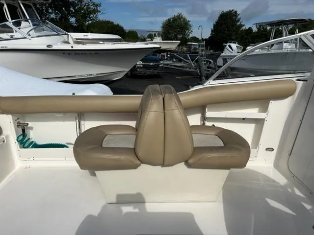 Slide: The Image of 2020 Key West 239 DFS boat interior with tan seating and white deck. - 24
