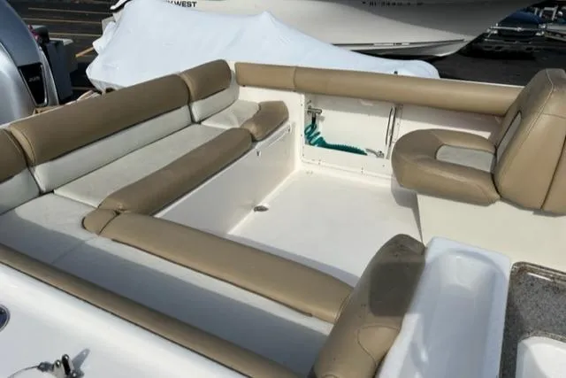 Slide: The Image of 2020 Key West 239 DFS boat interior with beige seating. - 28