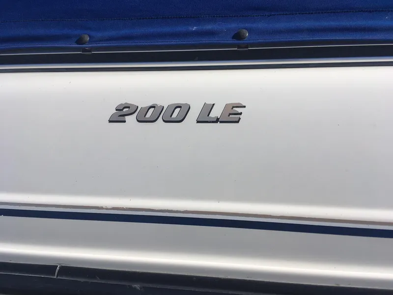 Slide: The Image of 1998 Chaparral 200 LE boat model emblem on white hull - 4