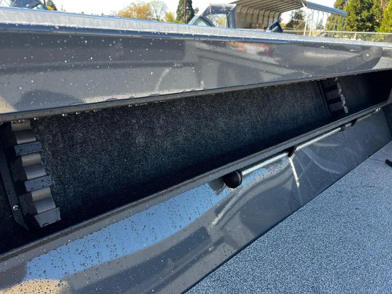 Slide: The Image of Close-up of 2024 Fish Rite Angler 18 boat interior storage compartment. - 10