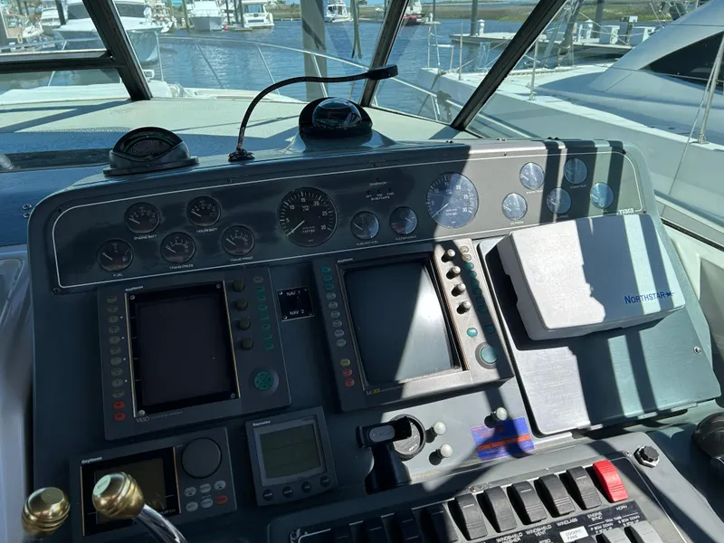 Slide: The Image of Control panel of a 1999 Tiara Yachts 4000 Express with navigation instruments. - 20