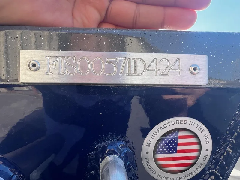 Slide: The Image of 2024 Fish Rite 180 Sportsman boat with serial number and USA manufacturing badge. - 14