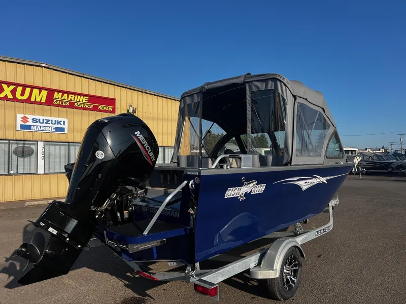 Slide: The Image of 2024 Fish Rite 180 Sportsman boat with Mercury outboard motor at dealership. - 3