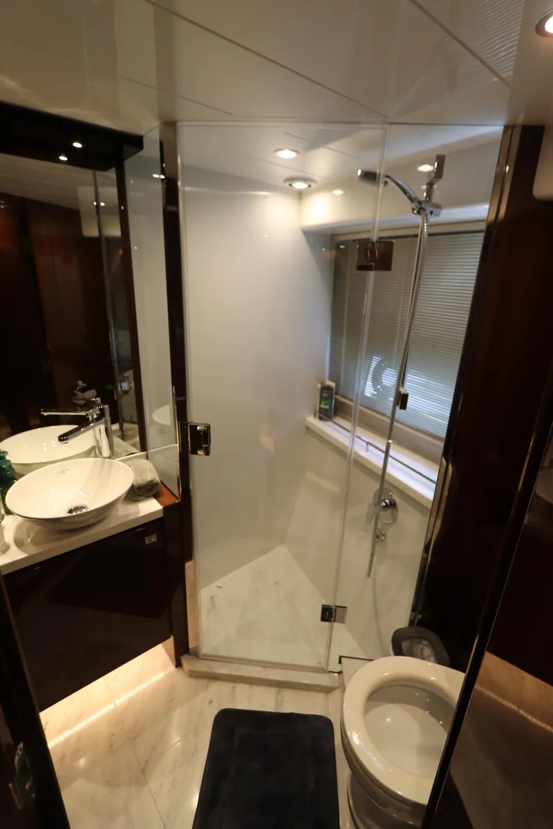 Slide: The Image of Luxurious bathroom in 2018 Princess V58 yacht with glass shower and modern fixtures. - 12