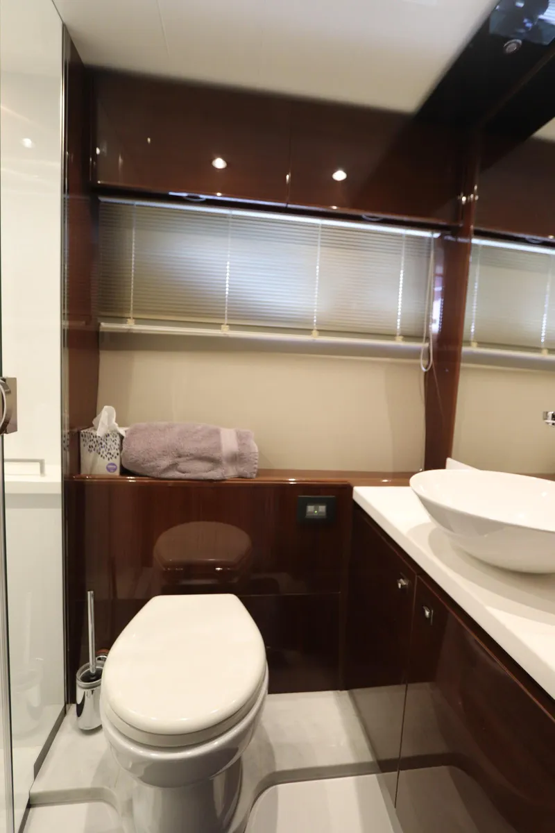 Slide: The Image of Luxurious bathroom in 2018 Princess V58 yacht with modern fixtures and elegant design. - 9