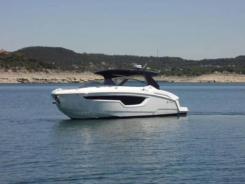 Slide: The Image of 2021 Cruisers Yachts 38 GLS I/O on a serene lake. - 17