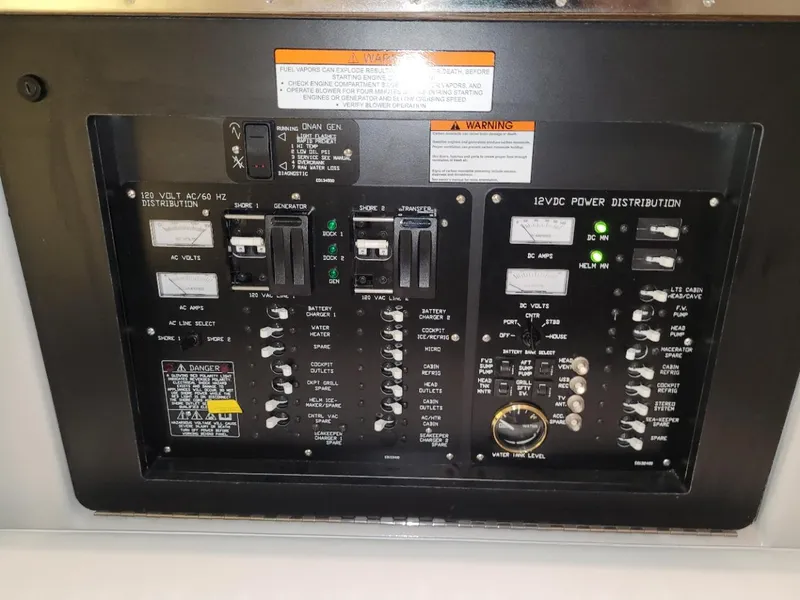 Slide: The Image of Electrical control panel on a 2021 Cruisers Yachts 38 GLS I/O boat. - 25