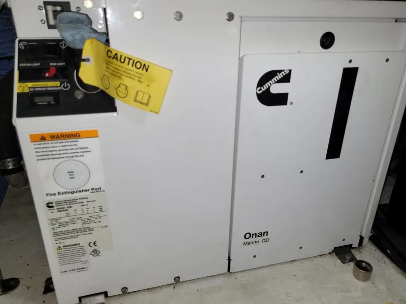 Slide: The Image of Cummins Onan Marine QD generator in a 2021 Cruisers Yachts 38 GLS I/O. - 27