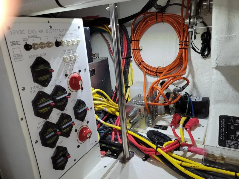 Slide: The Image of Electrical panel and wiring inside a 2021 Cruisers Yachts 38 GLS I/O boat. - 28