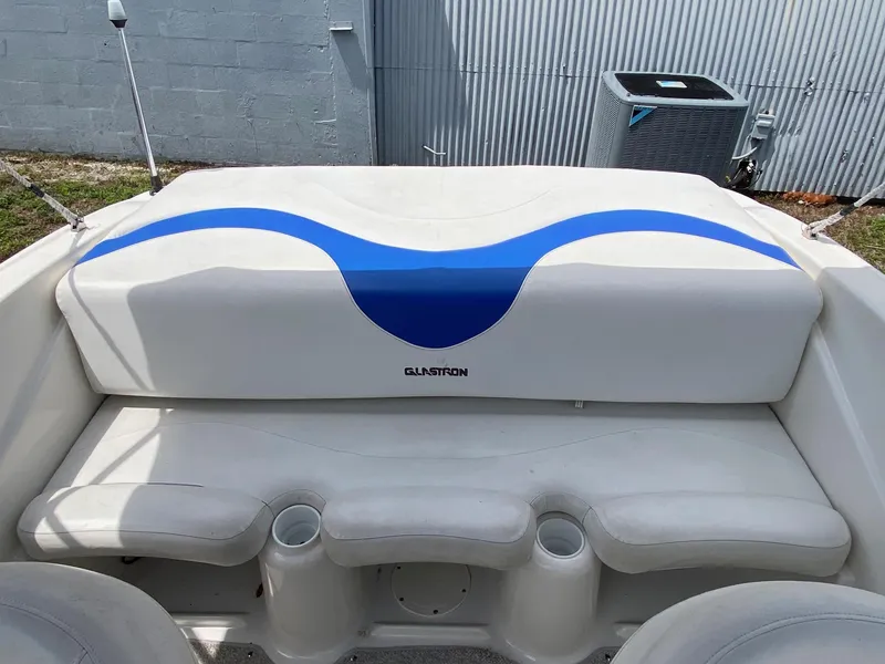 Slide: The Image of 2008 Glastron 175 MX boat interior with white and blue seating. - 14