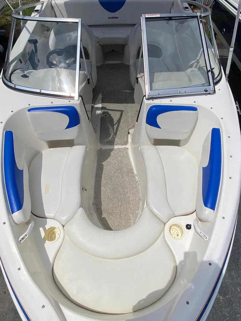 Slide: The Image of 2008 Glastron 175 MX boat interior with white and blue seating. - 15