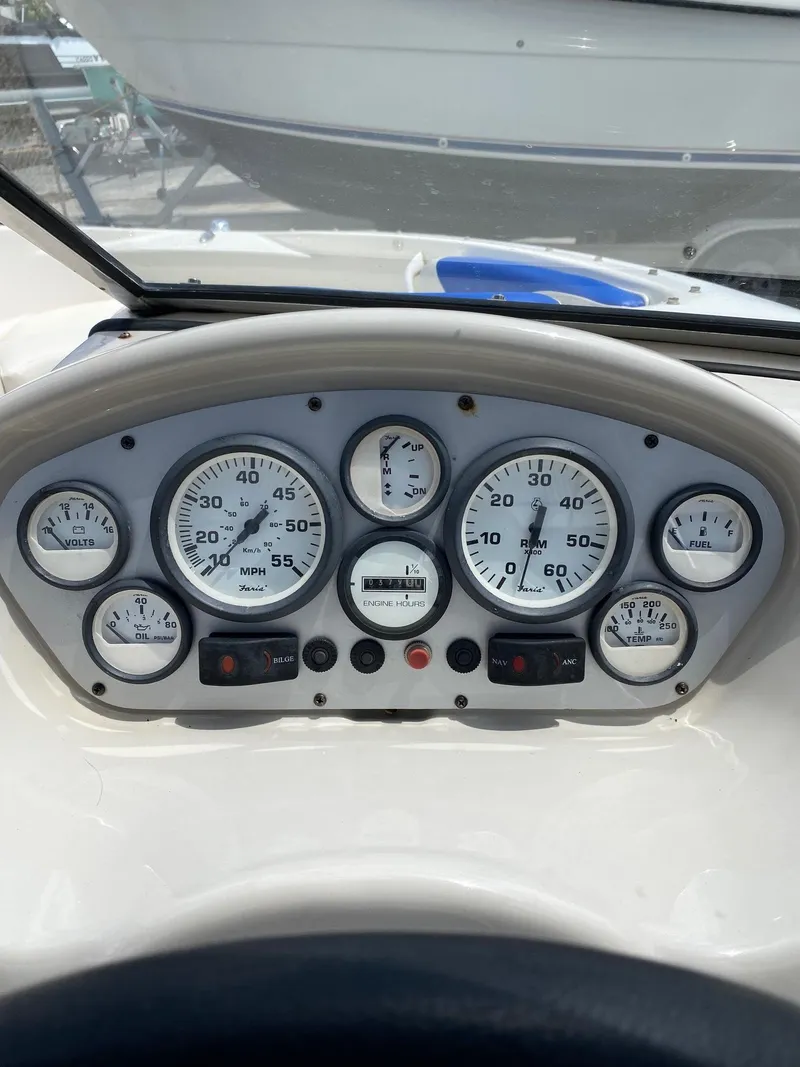 Slide: The Image of 2008 Glastron 175 MX boat dashboard with gauges and controls. - 7