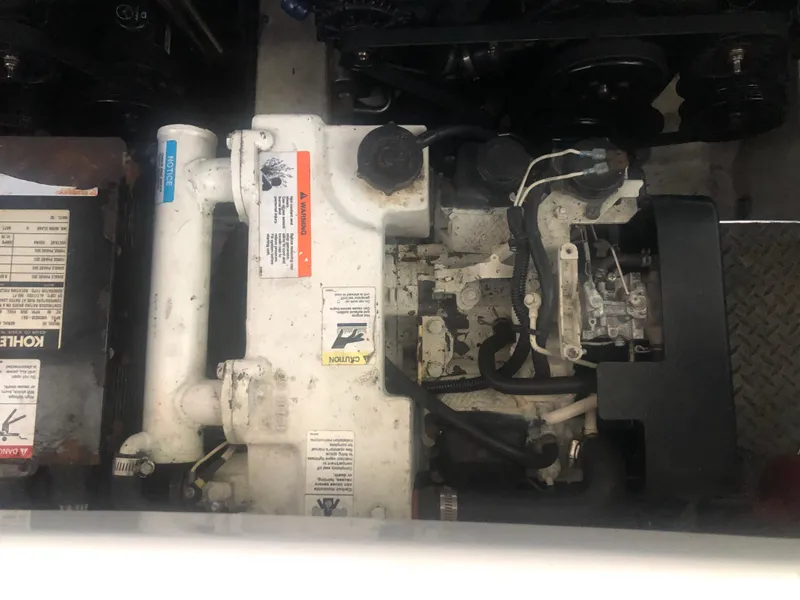 Slide: The Image of Twin MerCruiser engines in a 2004 Formula 330 Sun Sport boat. - 39