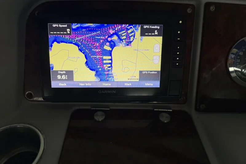 Slide: The Image of Garmin GPS display on 2004 Formula 330 Sun Sport boat dashboard showing navigation map. - 75