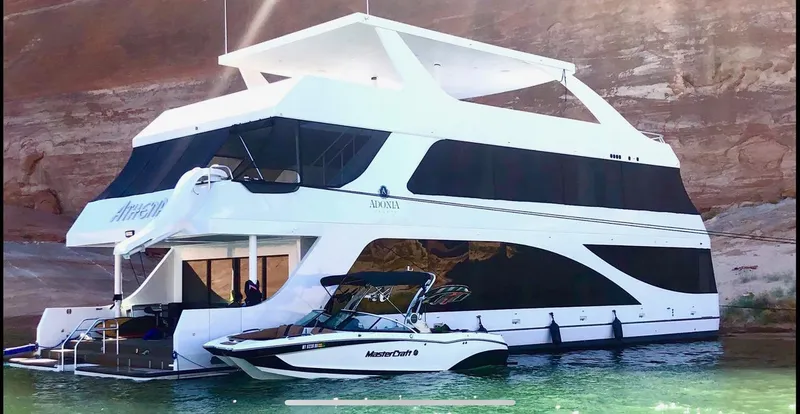 Slide: The Image of Luxury Adonia Athena yacht and speedboat on serene water, 2019 model. - 0